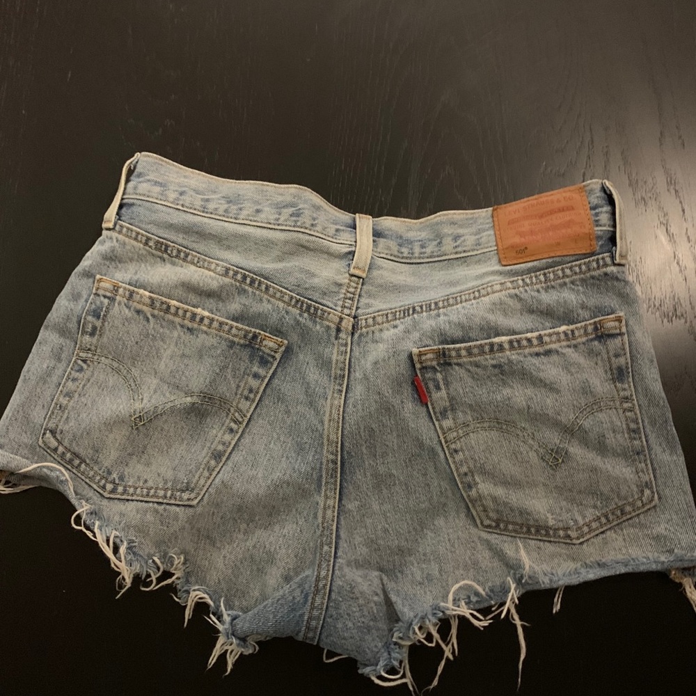 Levi’s distressed ripped jean shorts